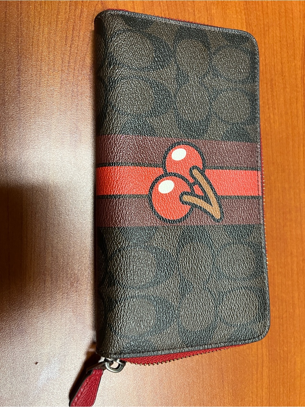Coach Brown Signature Zip Wallet with Red Cherry Graphic
